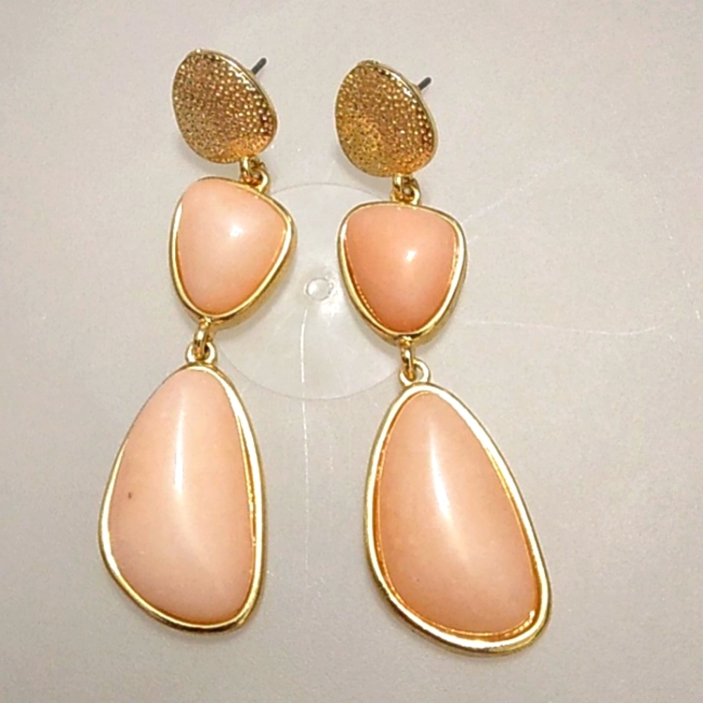 Peach stone and gold tone earrings